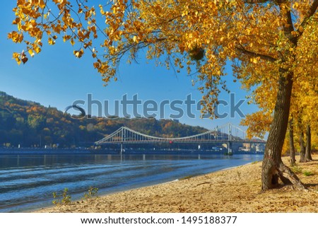 Pedestrian bridge across the Dnieper River, autumn landscape, Kiev, Ukraine