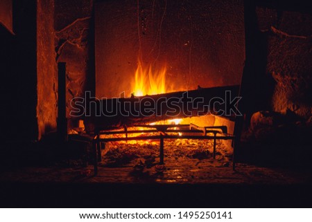 Fireplace in a chalet in Tuscany.