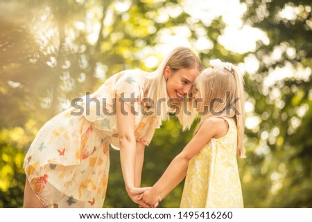 Thank you for showing me the real meaning of love. Mother and daughter outdoor.