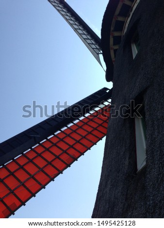 Traditional Windmill in Dutch Village of Zaanse Schans near Amsterdam