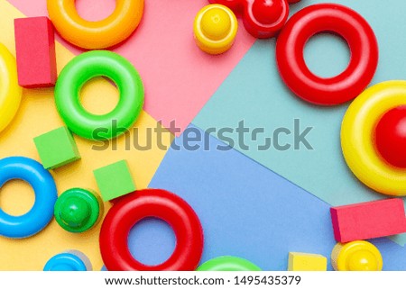 Colorful child kid’s education toys pattern background copy space on the bright background. Childhood infancy children babies concept