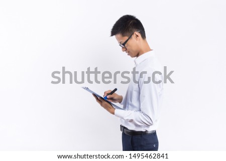 Asian businessman hold the file pad
