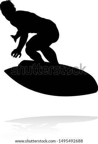 A high quality detailed silhouette of a surfer surfing the waves on his surfboard