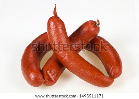 Tasty meat sausages ready for eat over white background