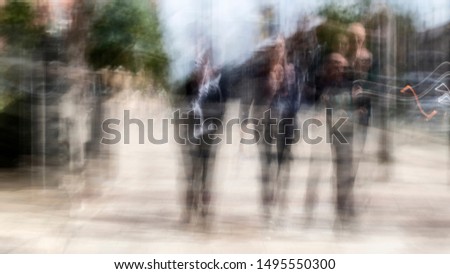 Street abstract - long exposure of people on the high street - intentional camera shake to introduce an impressionistic effect and light trails - creative filter applied