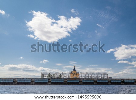 Alexander Nevsky Cathedral and warehouses by architect Shukhov in Nizhny Novgorod, Russia. View from Volga river