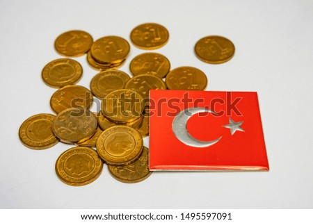 close up one turkish pennies with turkish flag.