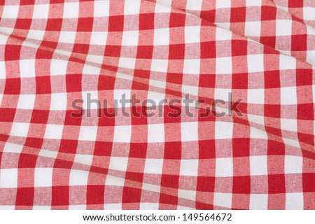 Red and white wavy gingham tablecloth texture background