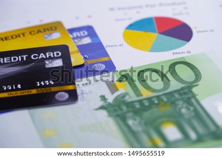 Credit card with Euro banknotes on chart graph background : Financial development, Accounting, Statistics, Investment Analytic research data economy office Business company banking concept.
        