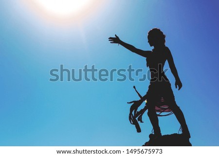 woman standing agains the sun in Israel Desert