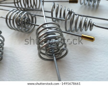Close-up: downing rods (frames for dowsing) on a white background