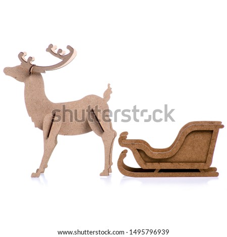 Wooden christmas deer with sleigh on white background isolation