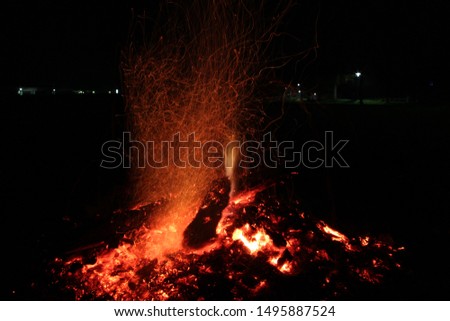 warm campfire tones at night
