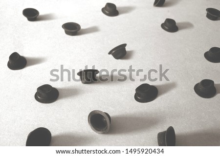 many black bowler hat on the ground Royalty-Free Stock Photo #1495920434