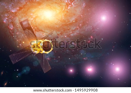 Space satellite telescope a research complex in orbit in the solar system observes the stars and opens up new celestial bodies in dark matter. This image elements furnished by NASA