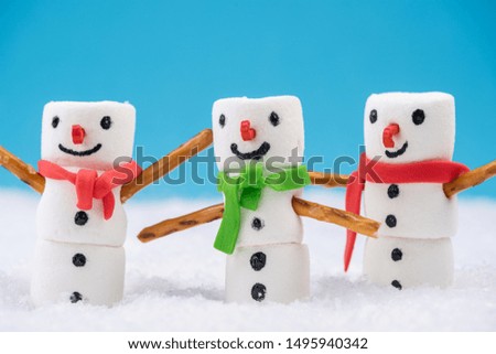 Happy Marshmallow Family Play in Snow. Funny Festive Christmas Card.