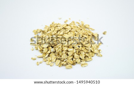 oat grains on white background	
