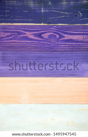 Close up colorful wooden texture background for advertising and promoting texts. Purple timber board are painting color like vintage hardwood. Abstract wallpaper.