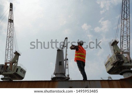 man taking photo for report work