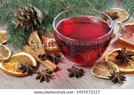 Christmas background. mulled wine, dried fruits and spices on a wooden table