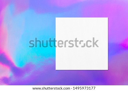 Empty white square flyer or business card mockup with soft shadows on holographic background. Flat lay, top view