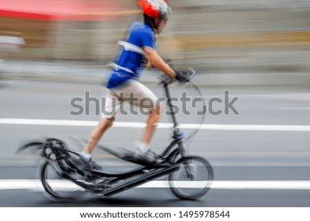 active people on bicycle  in the city roadway  in motion blur