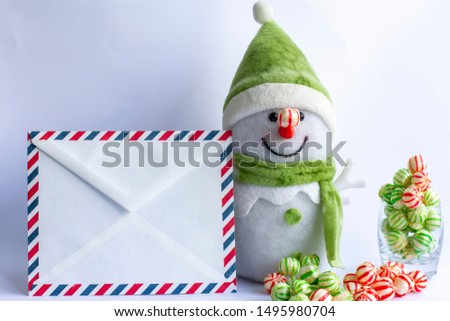Christmas figure of a snowman and gretting card