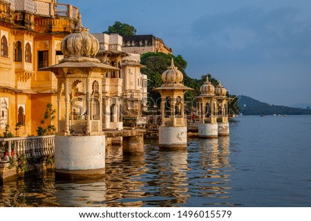 Udaipur, rajasthan, india- August 31, 2019: cenotaphs of bagore haveli at Bank of lake pichola in Udaipur city Royalty-Free Stock Photo #1496015579