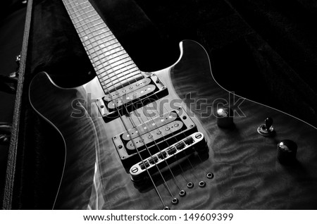 a beautiful electric guitar in a hard case Royalty-Free Stock Photo #149609399