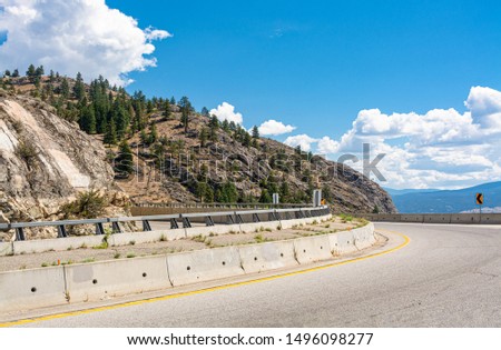 Tight bend of mountain road in Okanagan valley, British Columbia.