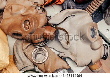 Old used gas masks are on the table