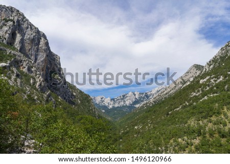 Beautiful sunny summer day in Paklenica National Park Croatia, Wonderful nature and landscape in Velebit Mountains. Calm, peaceful and happy outdoors picture.