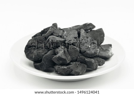 carbon, ashes, and black on white isolated background