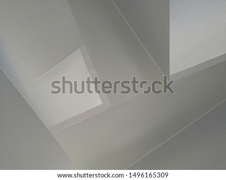 Collage photo of dropped ceiling panels. Realistic though unreal modern architecture fragment with polygonal angular geometric structure. Abstract black and white background in hi-tech style.