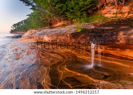 Miners Beach Falls (or Elliot Falls) at sunset, Pictured Rocks National Lakeshore, Michigan