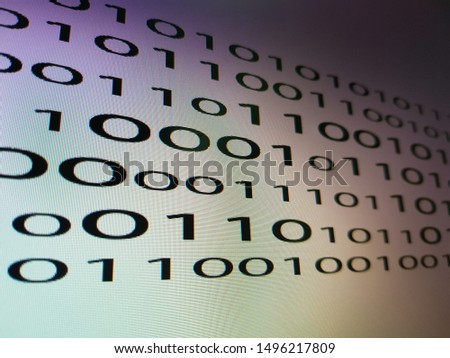 binary code on LCD screen white background.