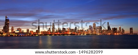 Panoramic view of Chicago skyline at dusk with Lake Michigan on the foreground, IL, USA