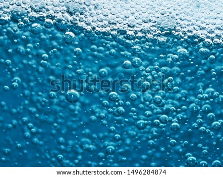 Super Macro Oxygen Bubbles Under Water on a Blue Background Concepts such as ecology and other successful projects, Close up