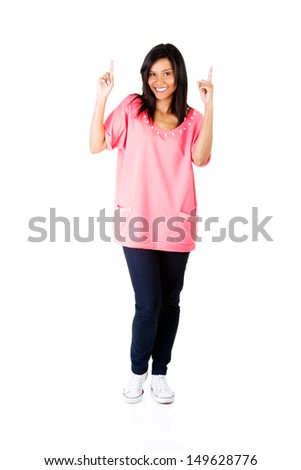 Happy , excited young woman pointing on copy space, isolated on white 