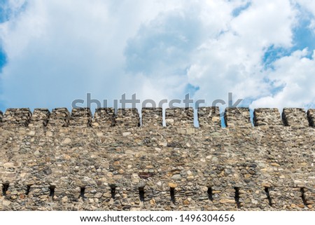 Ancient fortress wall against the sky