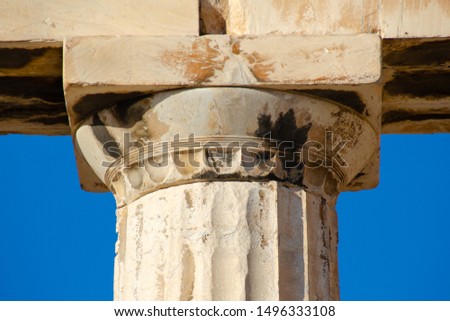 ATHENS, GREECE – NOVEMBER 4, 2018: A column capital in the Doric order on the ancient Greek temple of Parthenon which was built on Acropolis in the 5th century BC, dedicated to the goddess Athena.