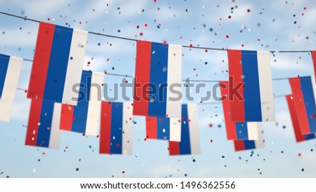 Russian flags in the sky with confetti.