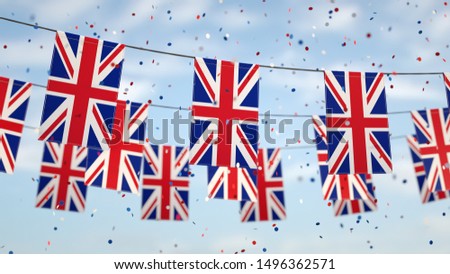 English flags in the sky with confetti.