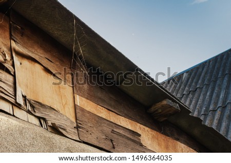 The roof of the old barn. Reporting about rural life. Close-up. Selective focus. Horizontally