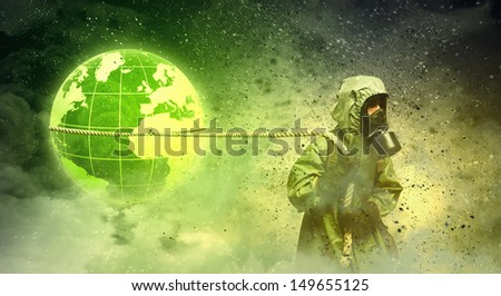 Man in respirator against nuclear background. Global pollution
