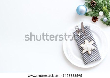 2020 year celebration with table setting, ginger cookies on white background top view mock up