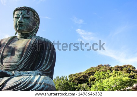 A picture of the Daibutsu bronze Buddha statute located in the kotuku-in temple in Kamakura, Japan. It is one of the largest statues of Buddha in the world and is included as a UNESCO site.