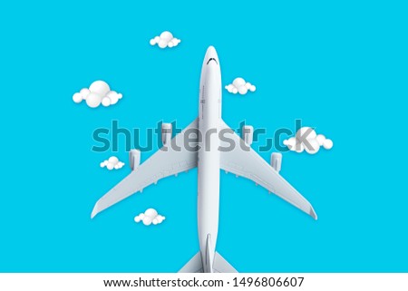 Small airplane model on the blue background