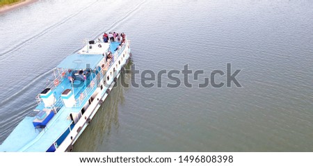 Pleasure boat floats on the Ural river