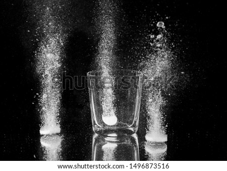 effervescent tablet dissolving in water